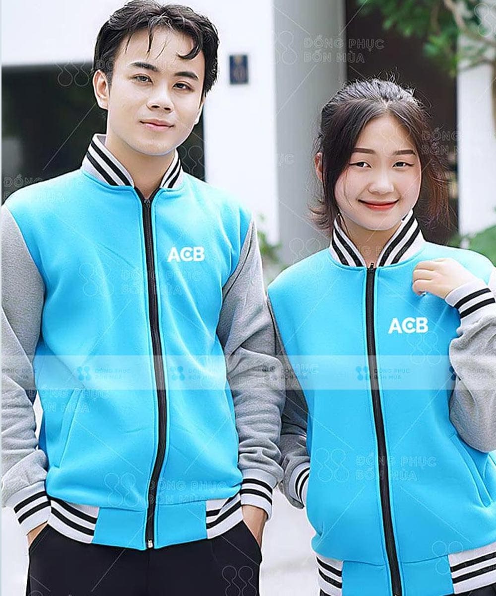 Đồng phục áo khoác bomber nỉ màu xanh da trời phối tay ghi