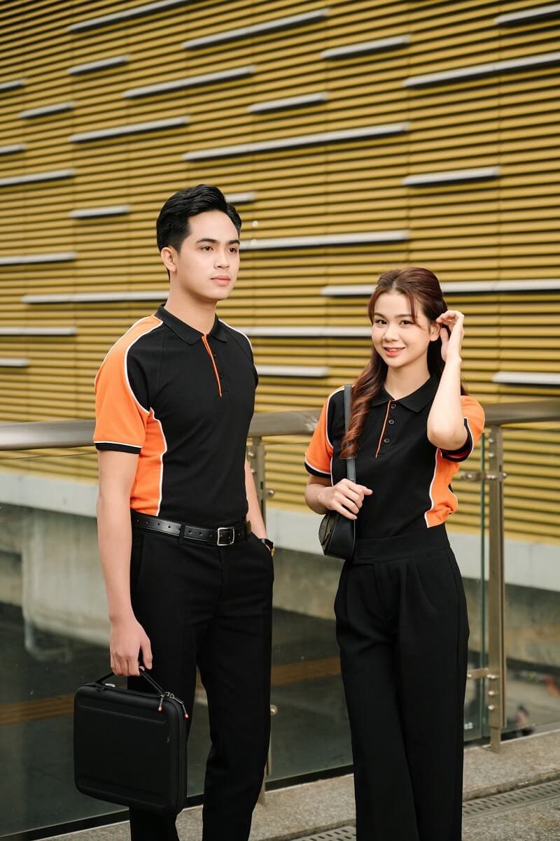 Áo đồng phục công ty màu đen phối cam thanh lịch